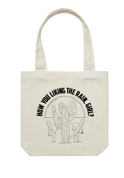 How you liking the rain, girl? Tote bag