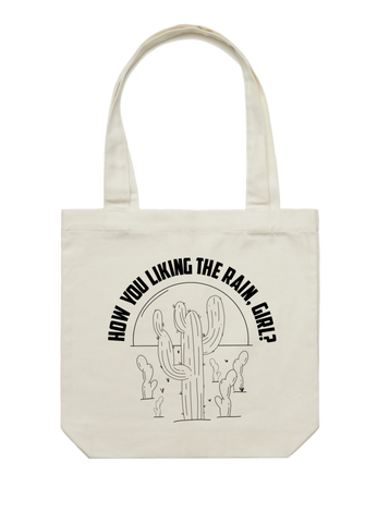 How you liking the rain, girl? Tote bag