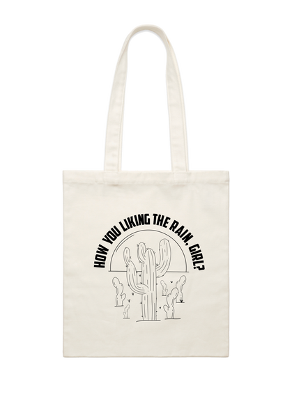 How you liking the rain, girl? Tote bag